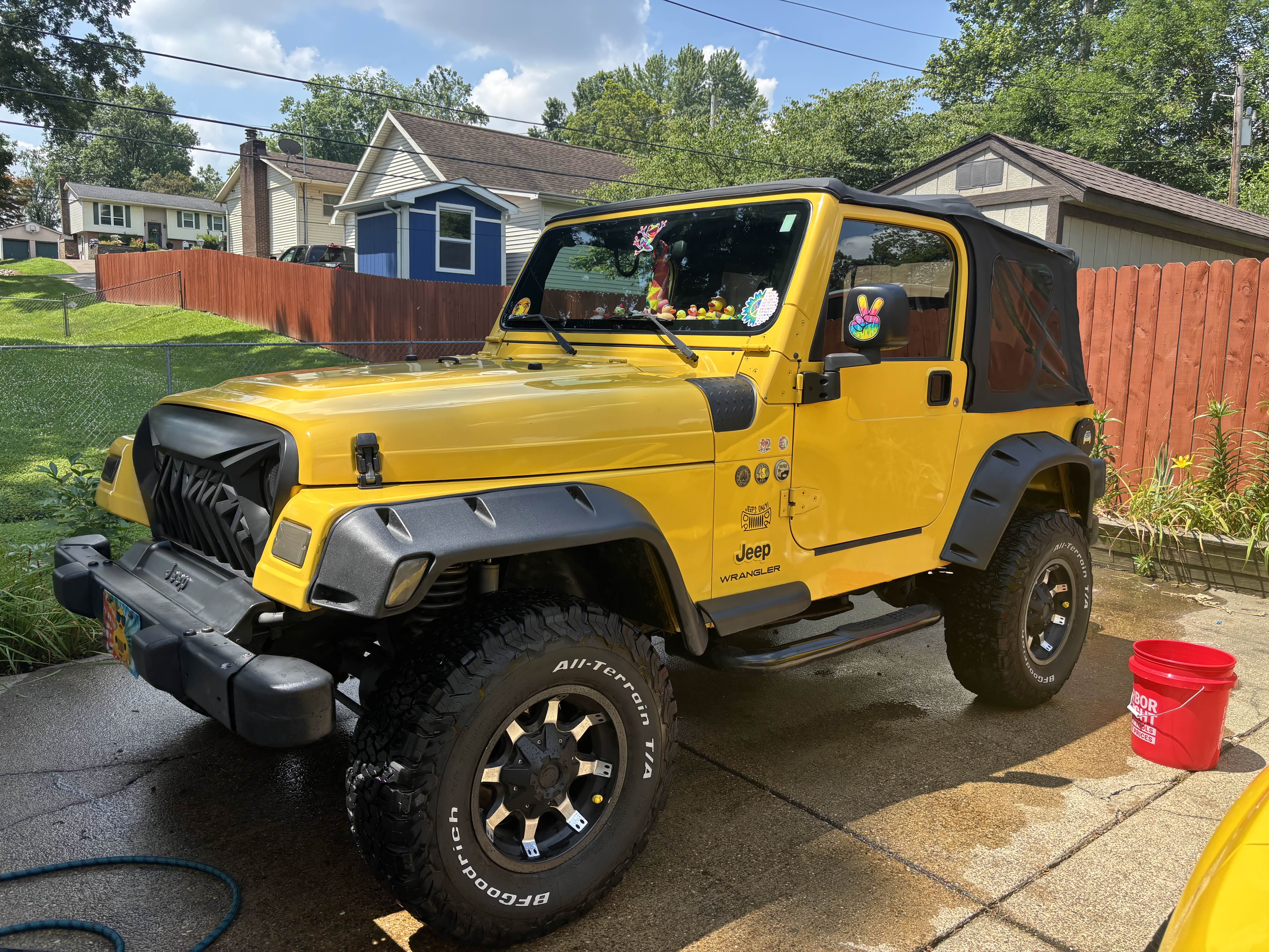 Yellow Jeep Wrangler after detailing